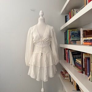 Indikah cutout long sleeved smocked and tiered mini dress medium
